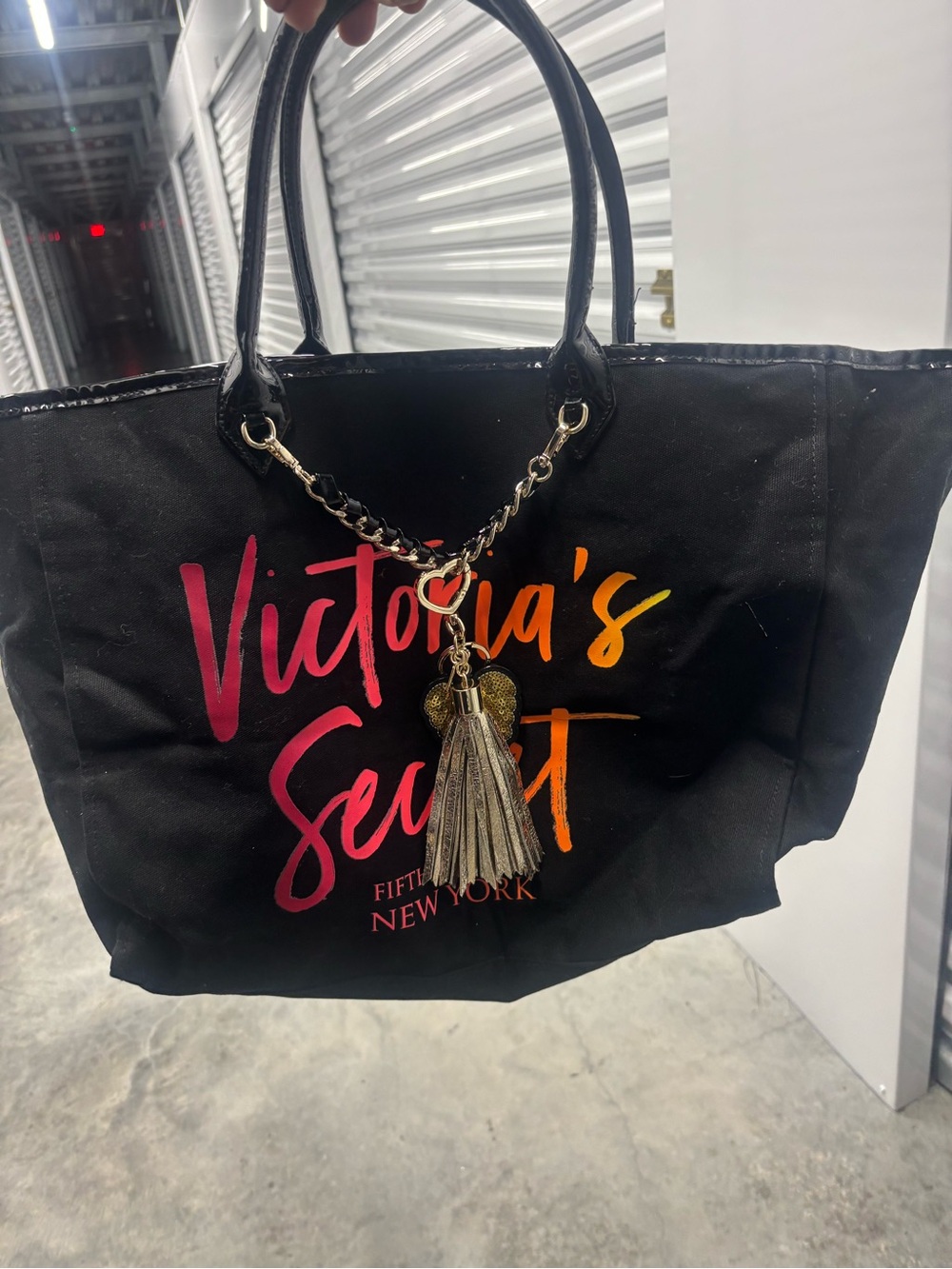 Victoria's Secret Black Tote with Pink & Orange Logo Script and Gold Tassel